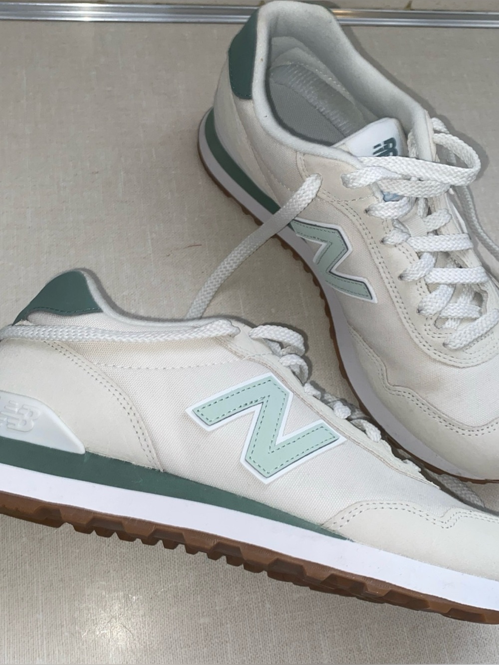 New Balance Women's Cream Sneakers with Green Accents